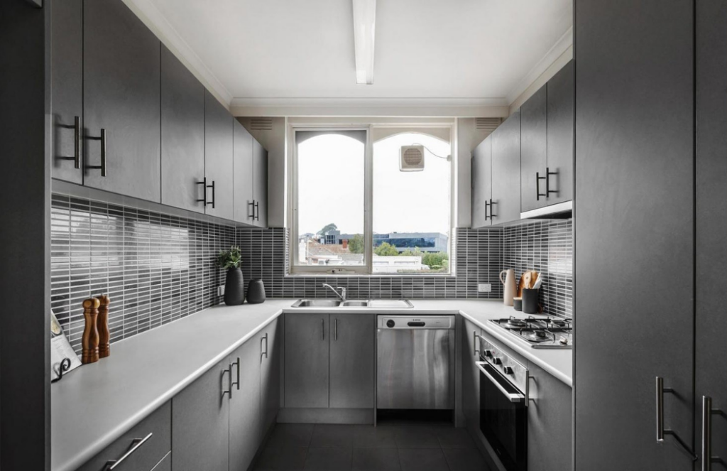 Charcoal kitchen stage, with a centre window, small modern apartment stage. 3122 postcode