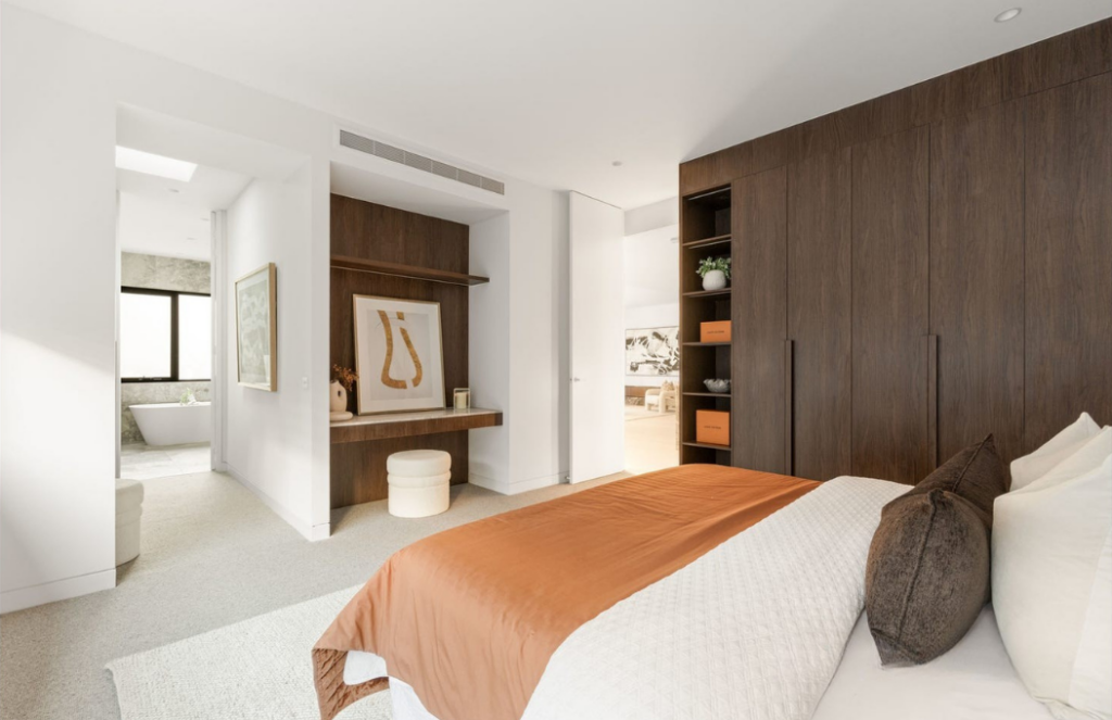 Glen iris main bedroom looking out, small inbuilt study with dark oak walls. 3146